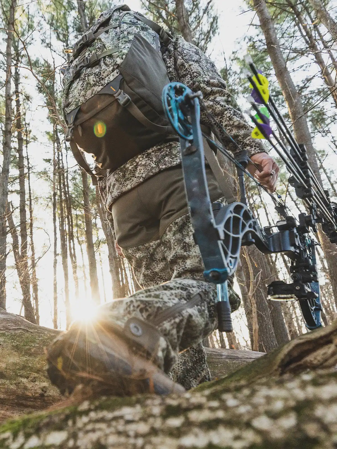 closeup of bow hunter in the forest