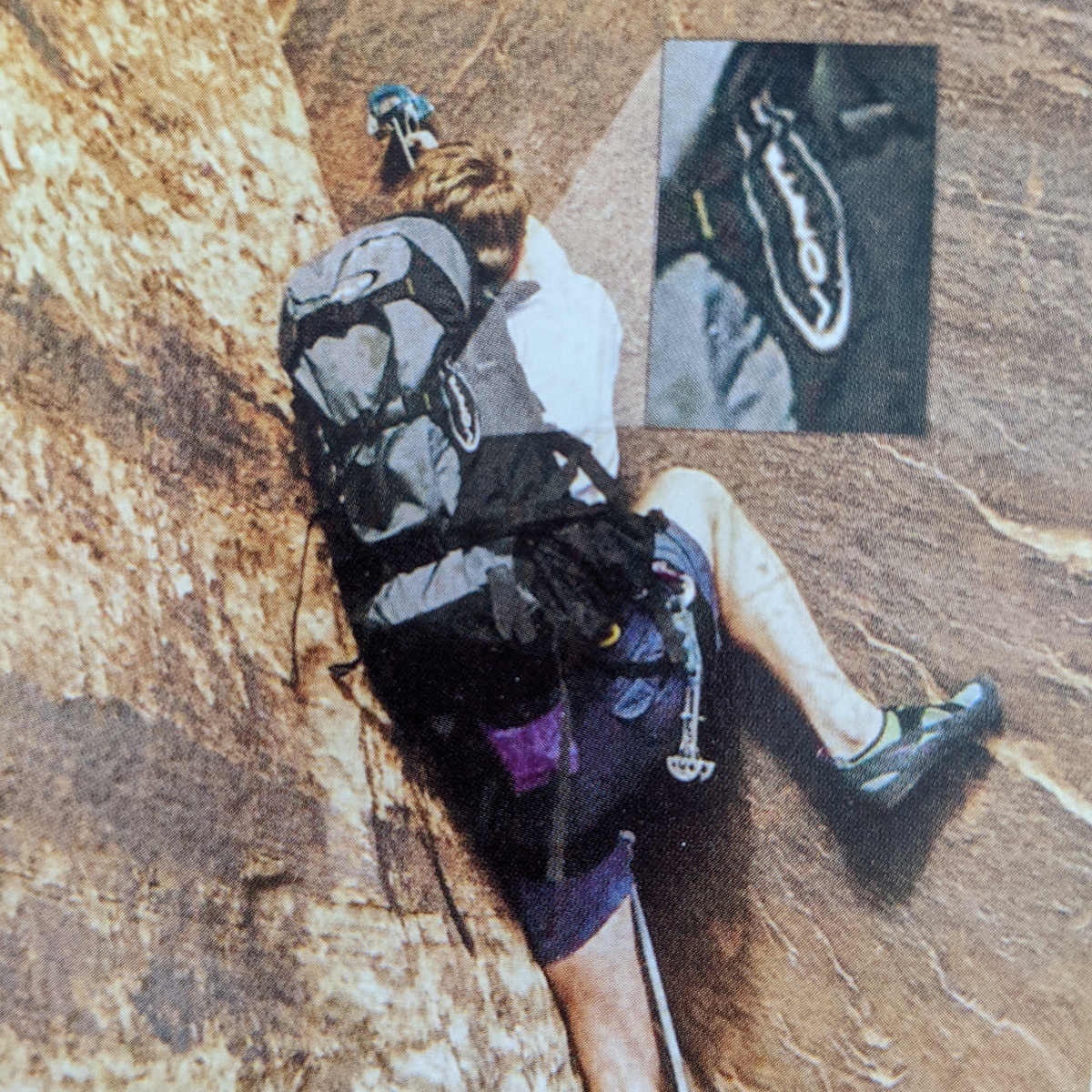 Climber scales Badlands rock face with a backpack featuring the Badlands skull logo; inset highlights the logo detail.
