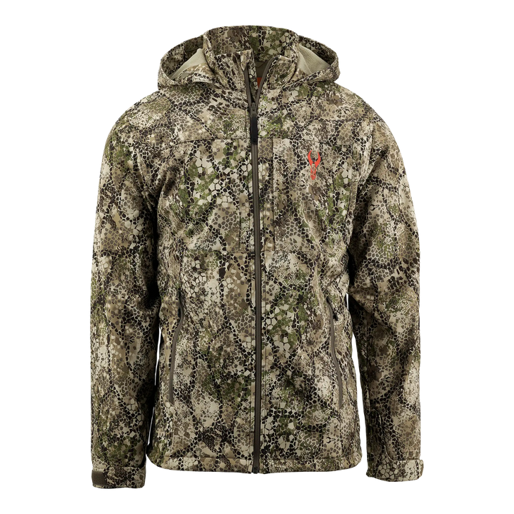 Camo jacket with hood, front zipper, and red Badlands skull logo on chest. Designed for outdoor or hunting use.