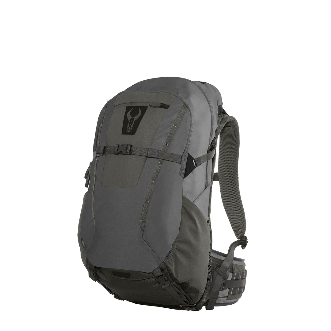 Gray Badlands backpack with padded straps and Badlands skull logo on front, designed for outdoor or hunting use.
