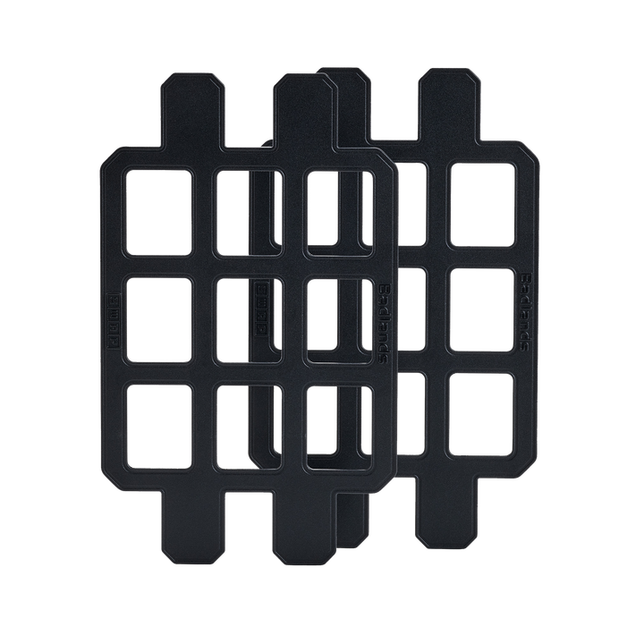 Two black Badlands GRID organizer panels with logo, designed for modular gear attachment and easy customization.