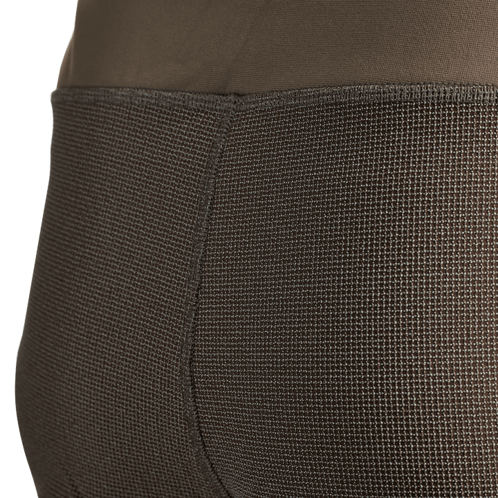 Close-up of Badlands hunting base layer fabric, showing textured, durable stitching for comfort and mobility.
