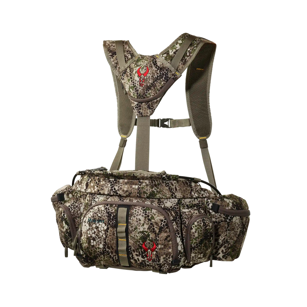 Badlands camo waist pack with harness and red skull logo, designed for hunting gear organization and comfort.