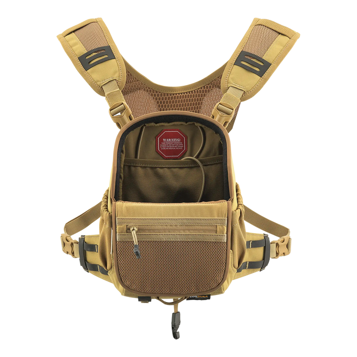 Tan Badlands chest pack with mesh straps, zippered front pocket, and Badlands skull logo inside main compartment.