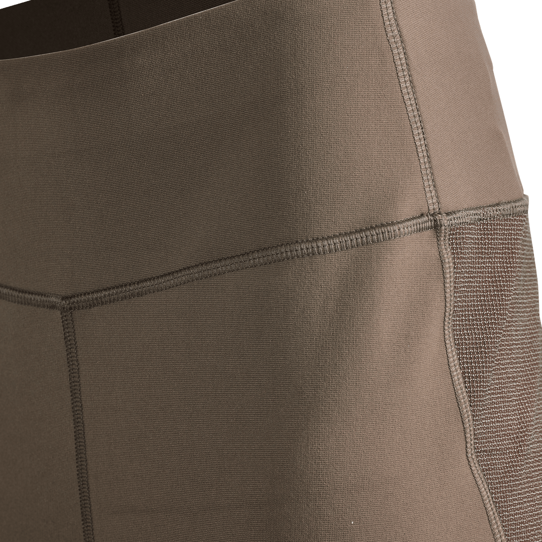 Close-up of Badlands hunting apparel waistband, showing durable stitching and stretch fabric for comfort and support.