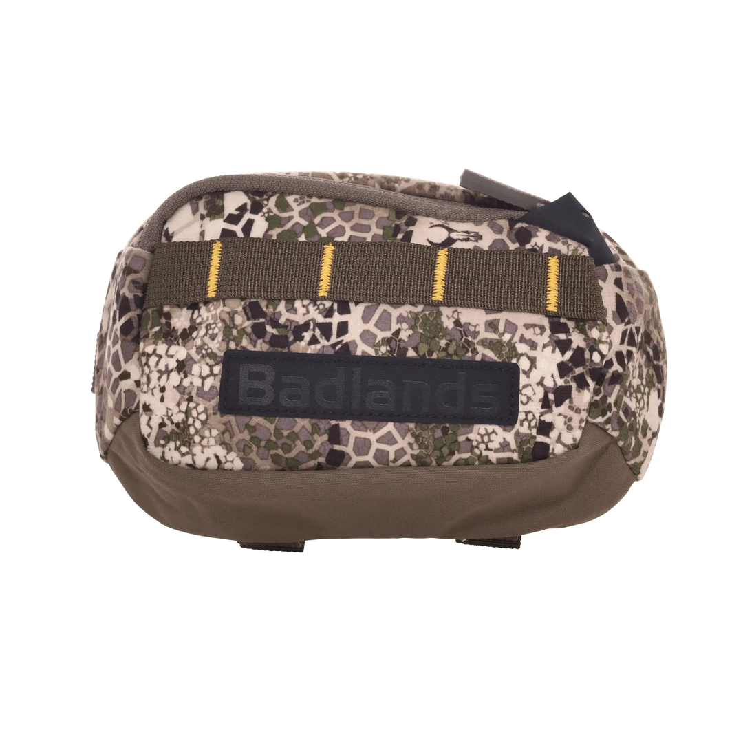 Badlands camo pouch with logo and MOLLE webbing, accessible zipper, and durable fabric for outdoor use.
