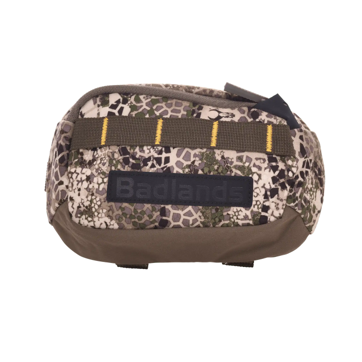 Badlands camo pouch with logo and MOLLE webbing, accessible zipper, and durable fabric for outdoor use.