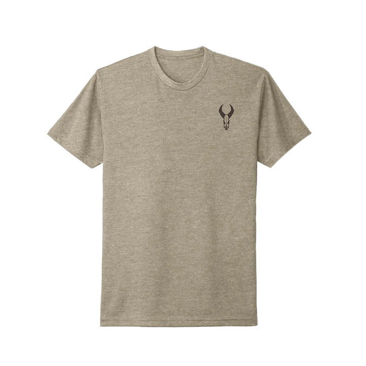 Heather tan Badlands t-shirt with black skull logo on left chest. Simple, ADA-friendly design.