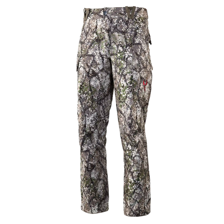 Badlands camo hunting pants with skull logo on pocket; earth-tone pattern for outdoor concealment.