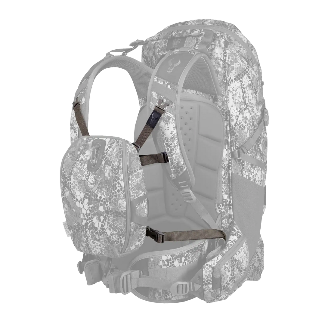 Badlands camo backpack with detachable pouch; skull logo visible on pouch. Straps connect pouch to main pack.