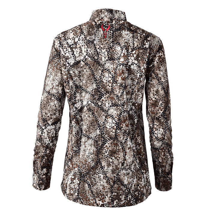 Back view of a Badlands camo jacket with a red Badlands skull logo below the collar.