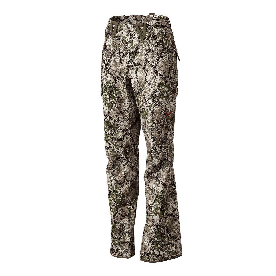 Badlands camo hunting pants with red skull logo on thigh, shown against a plain background.