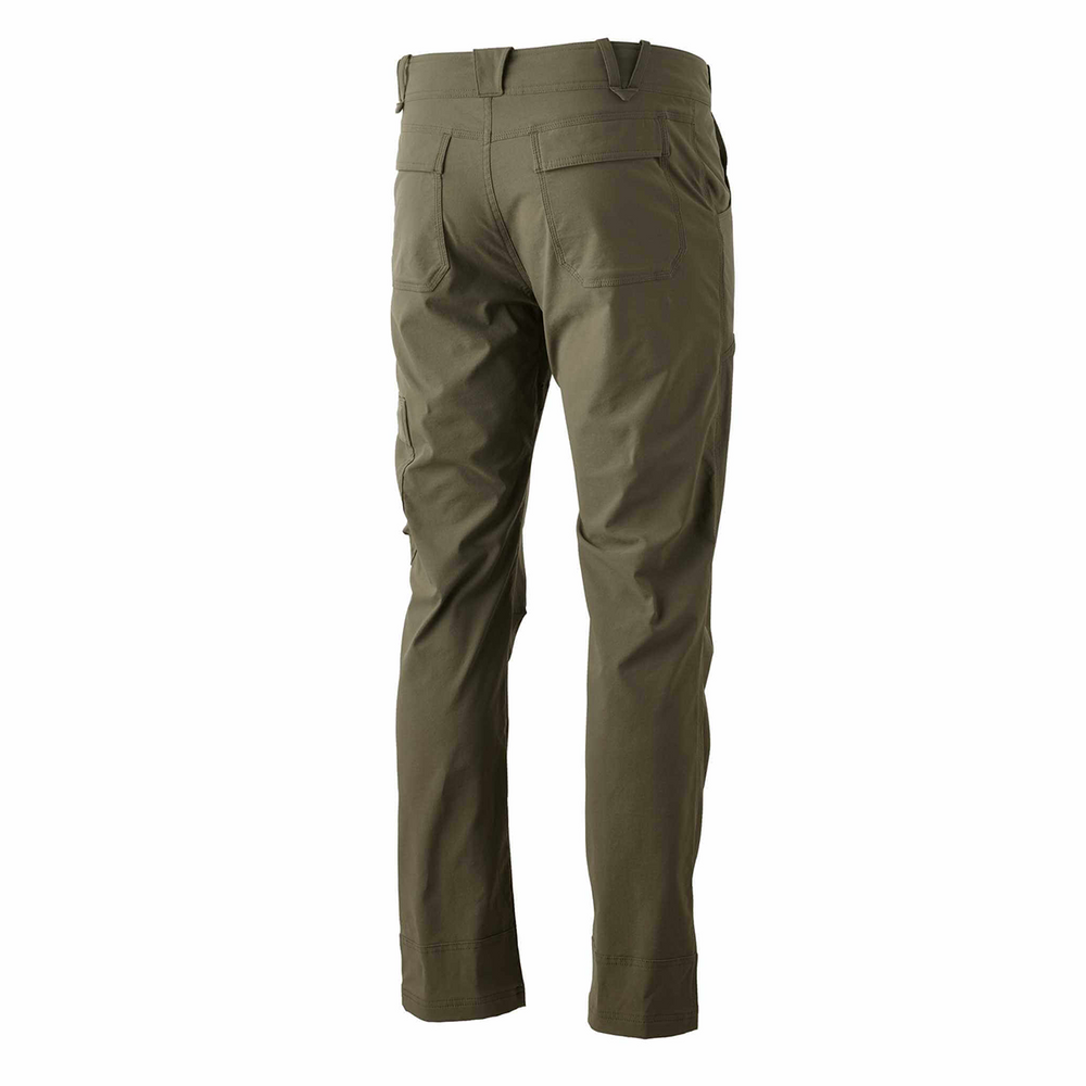 Olive Badlands pants, rear view, with pockets and belt loops. Subtle Badlands skull logo on lower right leg.