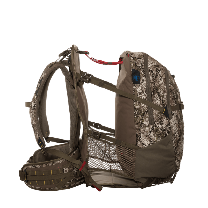 Badlands camo hunting backpack with mesh pockets, adjustable straps, and Badlands skull logo on the side.