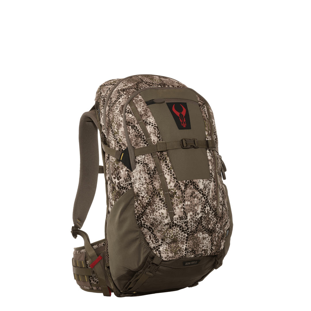 Badlands camo hunting backpack with red skull logo, padded straps, and multiple compartments for gear organization.