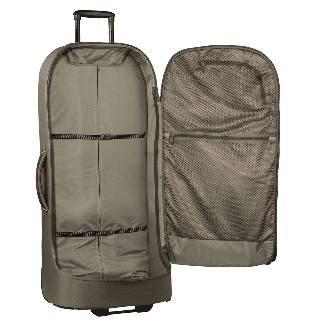 Open Badlands rolling duffel bag with spacious interior, mesh pockets, and skull logo on the side handle.