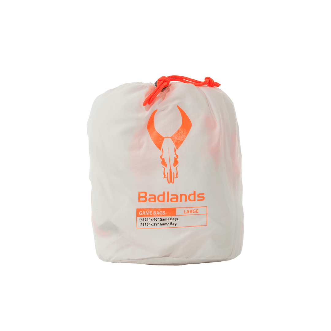 White Badlands game bag set with orange skull logo, labeled "Large" and sizes listed in bold, easy-to-read text.