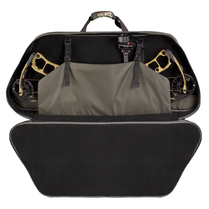 Badlands bow case open, showing interior straps securing a compound bow; Badlands skull logo on handle.