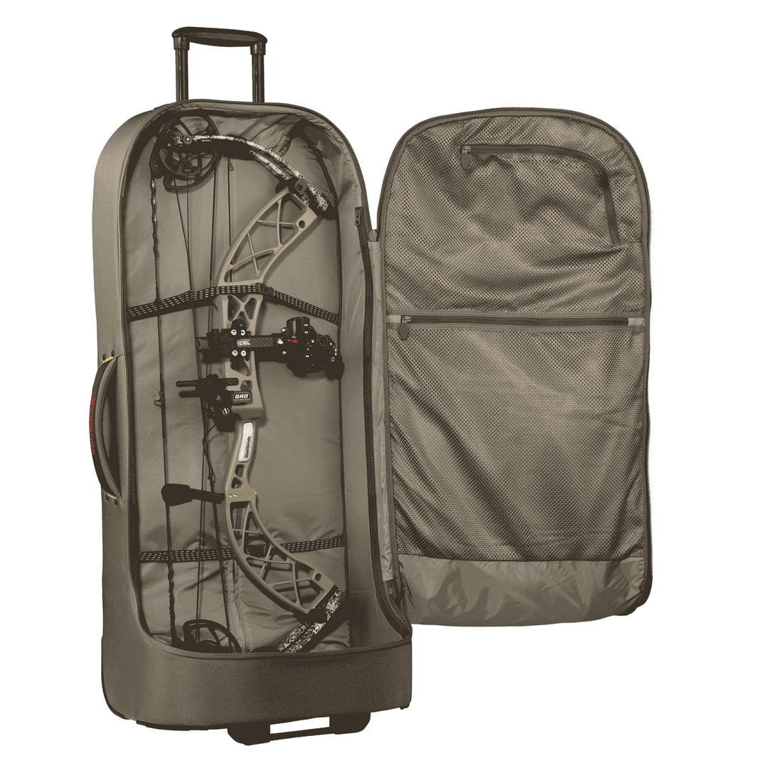 Badlands rolling bow case open, showing a secured compound bow and mesh storage pocket; Badlands skull logo on side.