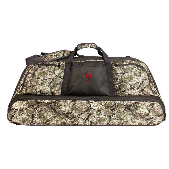 Camo duffel bag with black handles and a red Badlands skull logo on the front pocket.