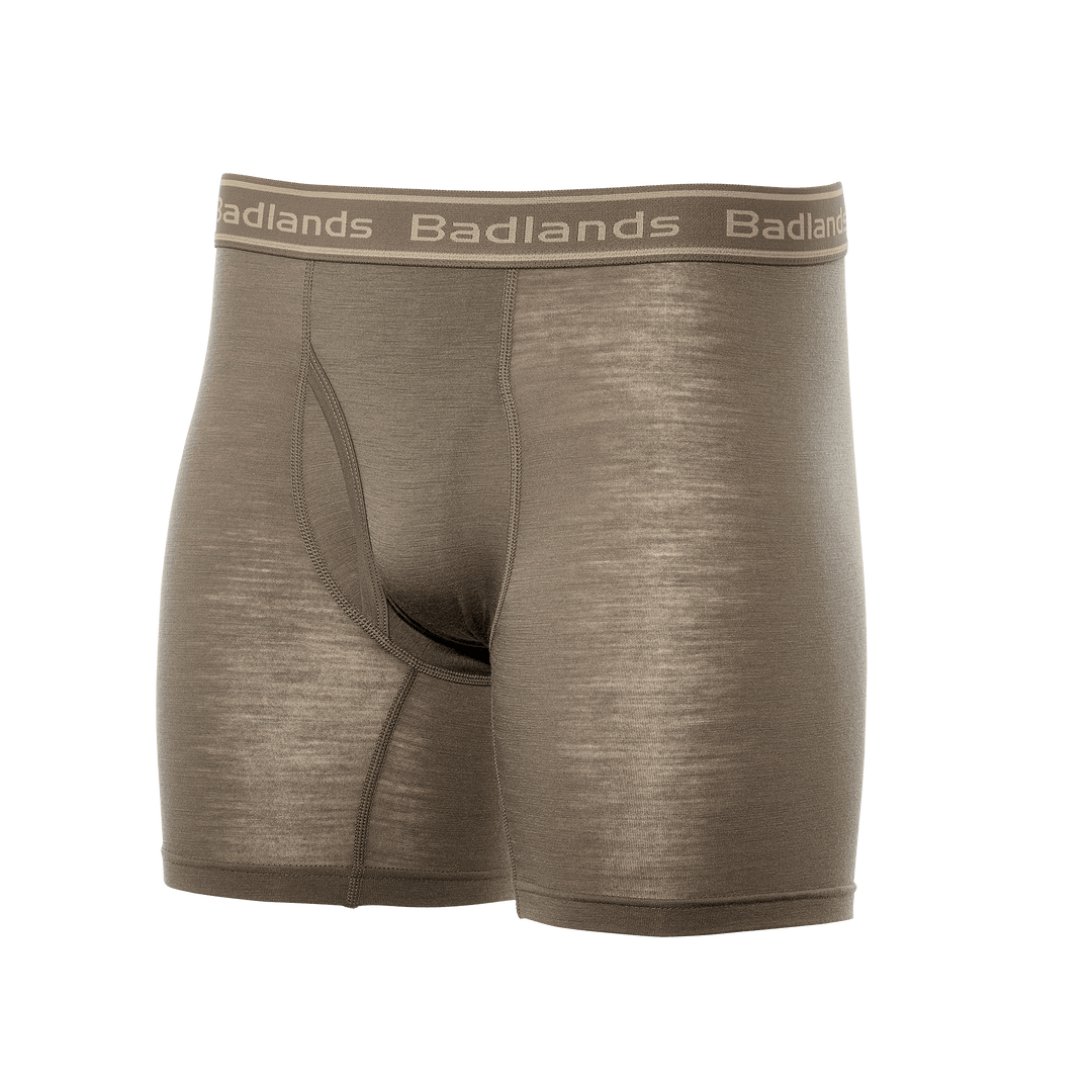 Tan Badlands boxer briefs with logo waistband, designed for comfort and support during outdoor activities.