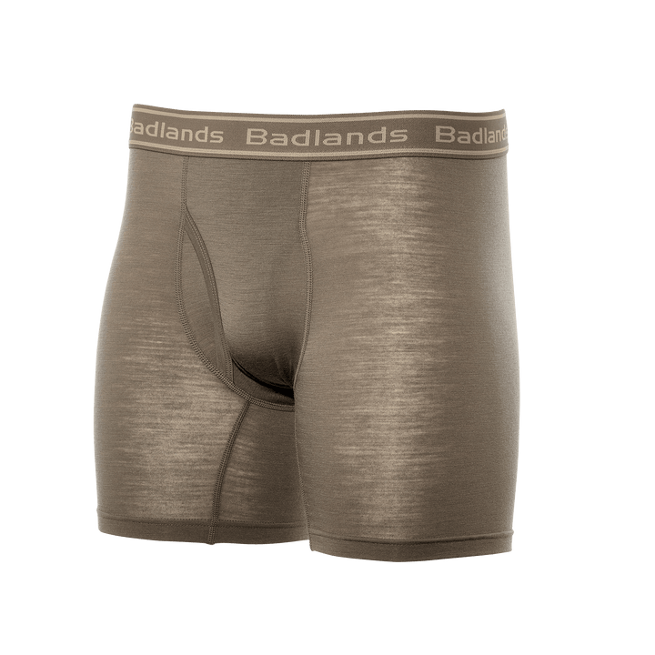 Tan Badlands boxer briefs with logo waistband, designed for comfort and support during outdoor activities.