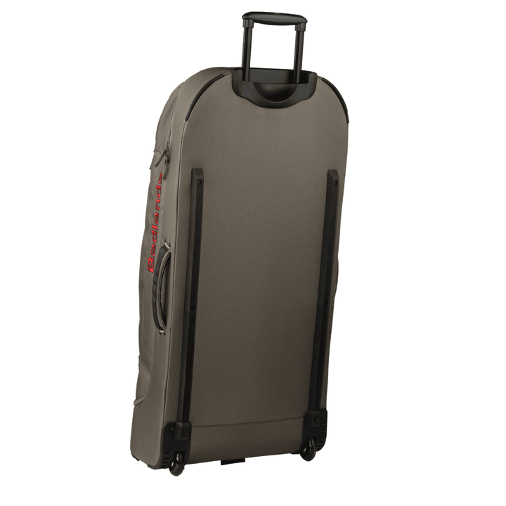 Badlands rolling travel bag in gray with logo and skull emblem, sturdy handle, and wheels for easy transport.
