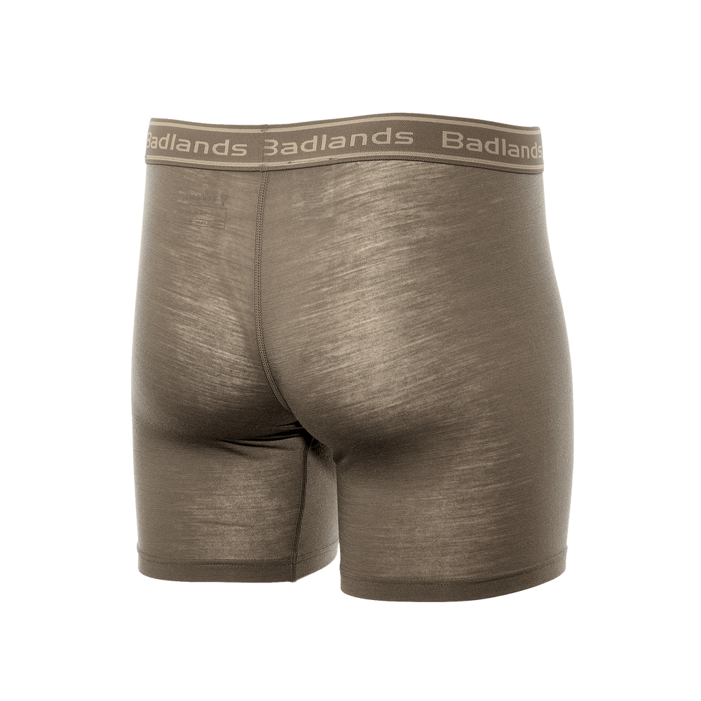 Back view of tan Badlands boxer briefs with logo waistband, seamless design, and smooth, stretchy fabric.